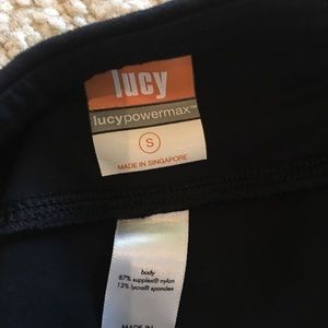 Lucy Capri leggings.  Split at calf.  Like new.